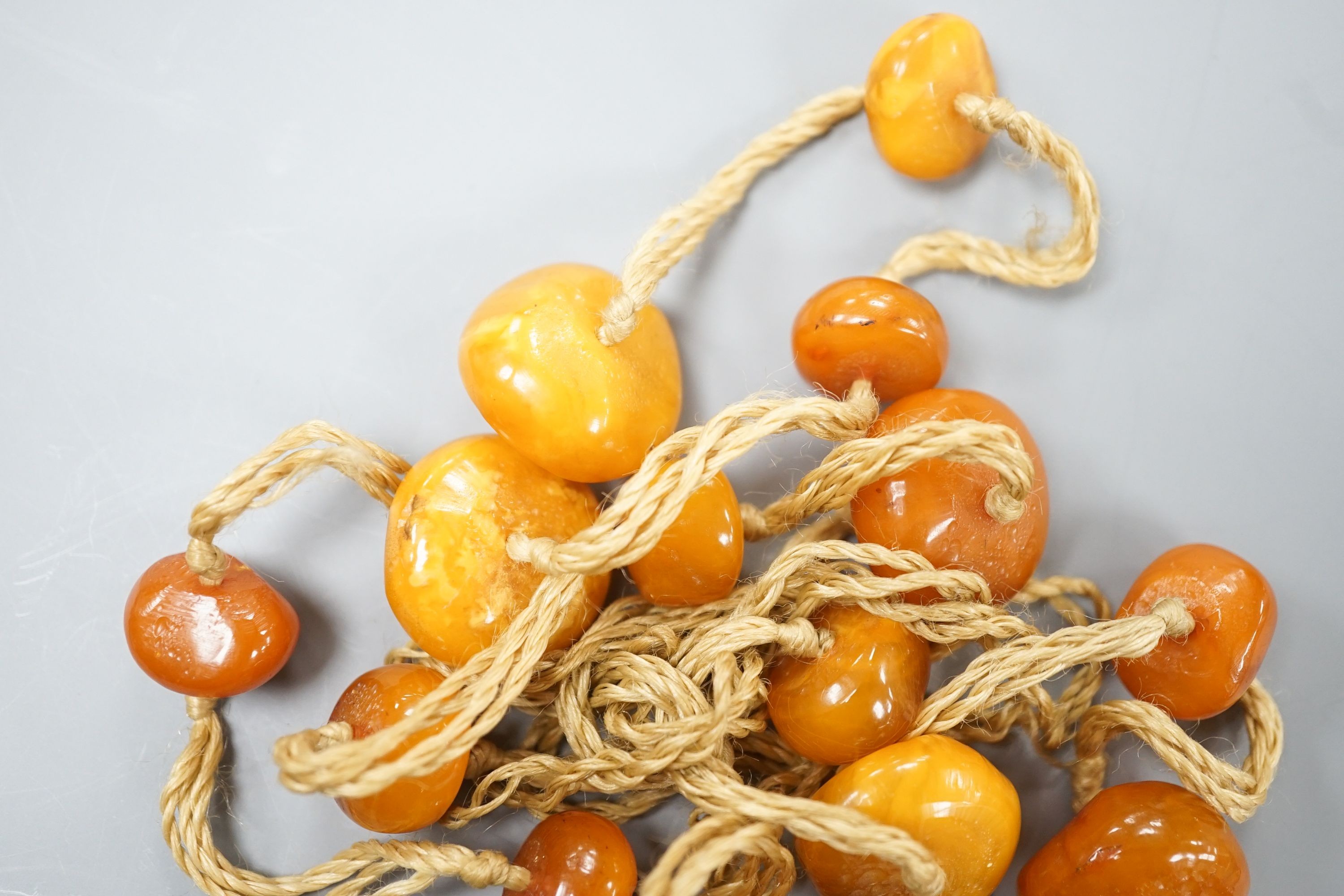 A butterscotch amber bead necklace, gross weight 55 grams.